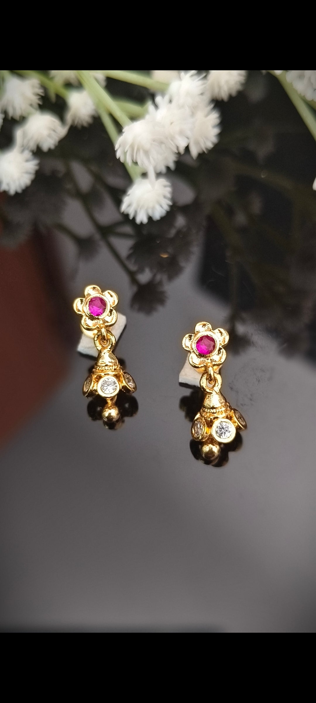Panchaloham Polished Floral Jhumka Earrings